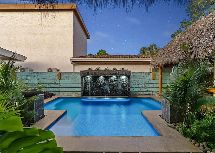 Modern With Chic Bohemian Style And Zen Outdoor Oasis With Swimming Pool And Tiki Style Dining Space *