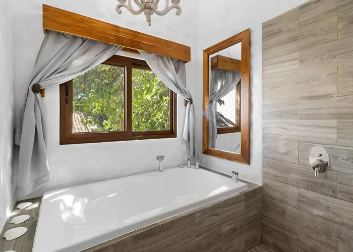 Modern With Chic Bohemian Style And Zen Outdoor Oasis With Swimming Pool And Tiki Style Dining Space *