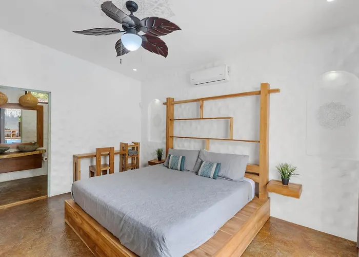 Modern With Chic Bohemian Style And Zen Outdoor Oasis With Swimming Pool And Tiki Style Dining Space Potrero (Guanacaste)