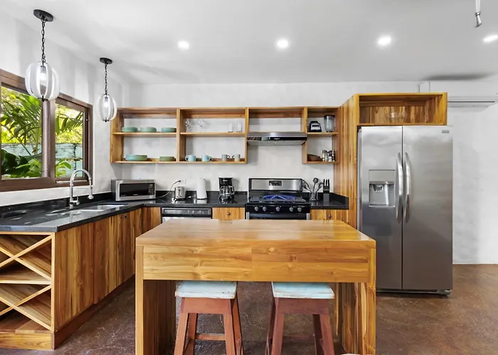 Modern With Chic Bohemian Style And Zen Outdoor Oasis With Swimming Pool And Tiki Style Dining Space *