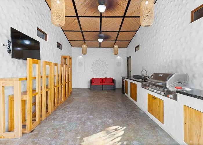 Modern With Chic Bohemian Style And Zen Outdoor Oasis With Swimming Pool And Tiki Style Dining Space *