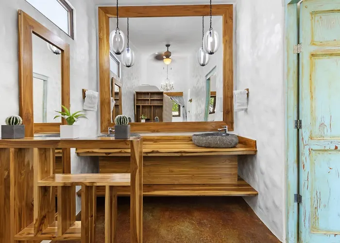 Modern With Chic Bohemian Style And Zen Outdoor Oasis With Swimming Pool And Tiki Style Dining Space Potrero (Guanacaste)