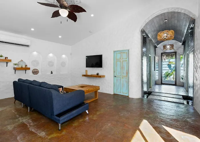 Modern With Chic Bohemian Style And Zen Outdoor Oasis With Swimming Pool And Tiki Style Dining Space *